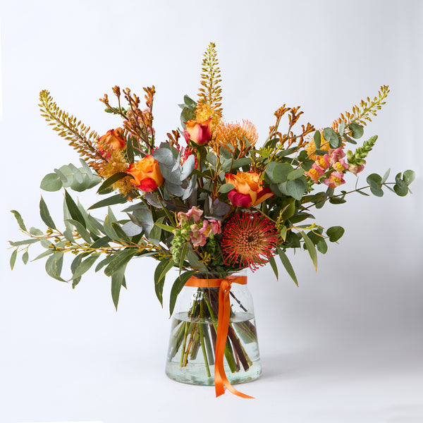 A Clockwork Orange (Eremurus / Orange roses / Kangaroo Paw/ Leucospermum / Snapdragon / Eucalyptus)